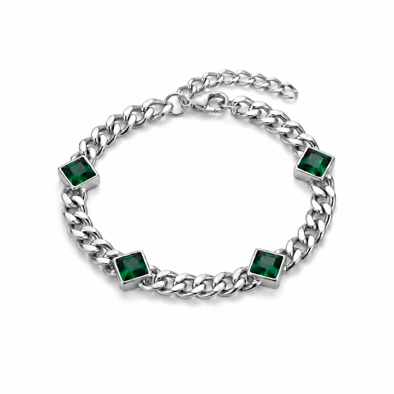 Silver chain bracelet with green gemstones on a white background